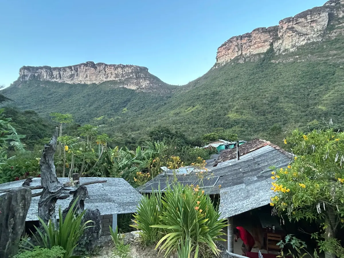 House of natives and beautiful mountains in the back